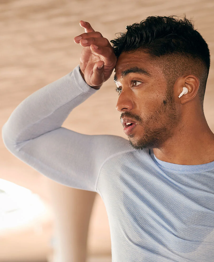 Young man excessively sweating after a workout